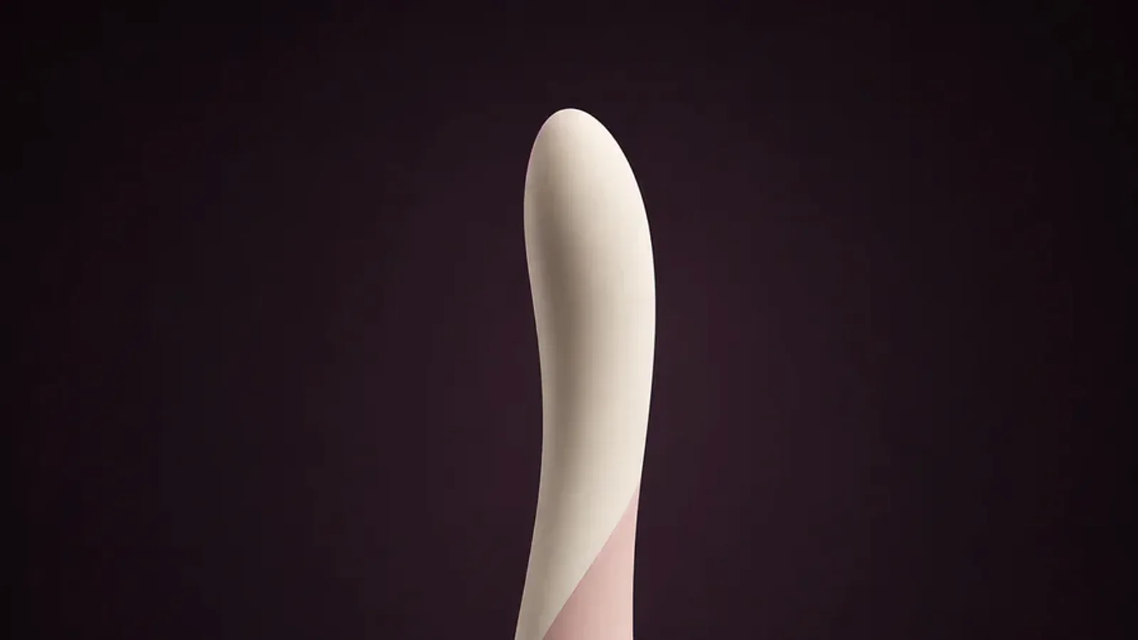 An unbranded app-controlled personal-wellness device with a charging cable and plain storage pouch on a neutral product table.