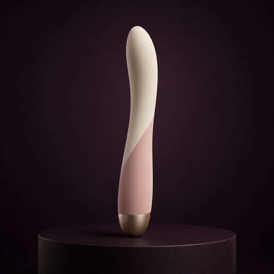 A premium personal wellness product photographed to show a smooth retail-ready material finish.